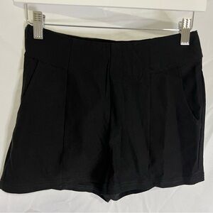 Black Pleated Shorts with zipper on the side.